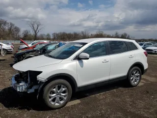 2015 Mazda CX-9 Touring with VIN JM3TB3CA4F0463059, listed as a Copart auction lot 51910005 with 120,164 mi miles and Salvage Title. Bid and sale history available at carsss.com. Image 1.