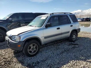 1997 Honda CR-V with VIN JHLRD184XVC005210, listed as a Copart auction lot 46392155 with 296,613 mi miles and Salvage Title. Bid and sale history available at carsss.com. Image 1.