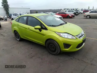2012 Ford Fiesta SE with VIN 3FADP4BJ3CM159435, listed as a IAAI auction lot 38286404 with 131,808 mi miles and . Bid and sale history available at carsss.com. Image 1.