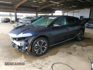 2023 Kia EV6 Wind z VIN KNDC34LA9P5150377, wystawiony jako Copart lot #53397395 z przebiegiem 56 127 mil mil oraz Czysty tytuł • Clean title. Historia ofert i sprzedaży dostępna na DreamBid. Obrazek 1.