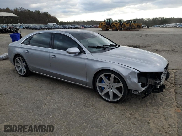 2016 Audi A8 3.0T with VIN WAU34AFD6GN010205, listed as a Copart auction lot 82362184 with 118,464 mi miles and Salvage Title. Bid and sale history available at DreamBid. Image 4.