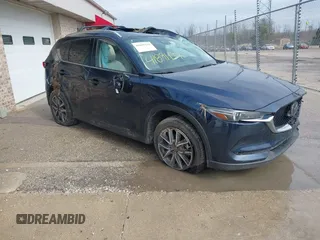 2018 Mazda CX-5 Grand Touring with VIN JM3KFADM1J1439544, listed as a IAAI auction lot 41891134 with 54,132 mi miles and . Bid and sale history available at DreamBid. Image 1.