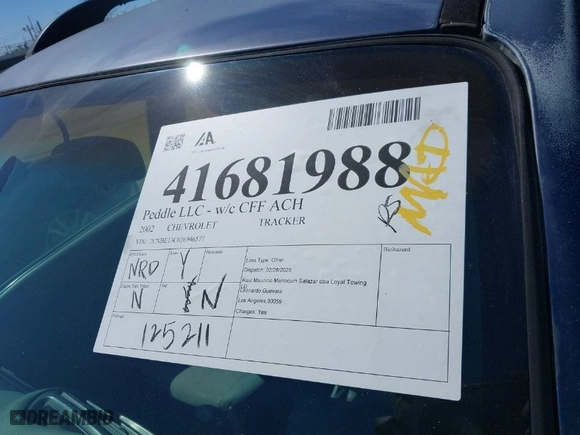 2002 Chevrolet Tracker with VIN 2CNBE13C026946577, listed as a IAAI auction lot 41681988 with NaN miles. Bid and sale history available at carsss.com. Image 13.