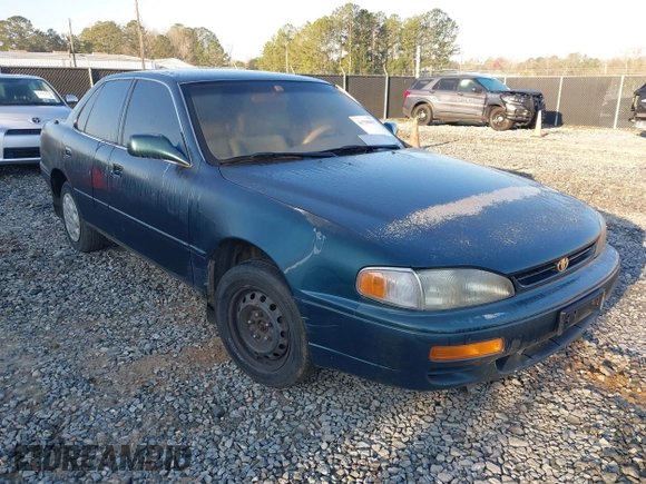 1996 Toyota Camry DX with VIN JT2BG12K2T0416797, listed as a IAAI auction lot 41789017 with 312,858 mi miles. Bid and sale history available at carsss.com. Image 1.