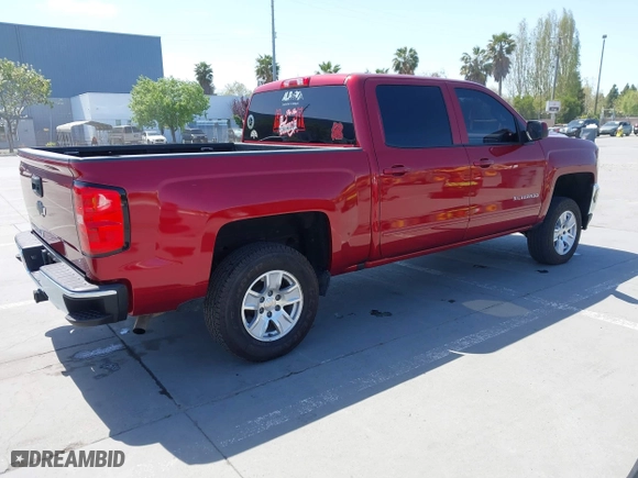 2018 Chevrolet Silverado 1500 LT with VIN 3GCUCRER8JG299111, listed as a IAAI auction lot 42063560 with 99,888 mi miles. Bid and sale history available at carsss.com. Image 4.