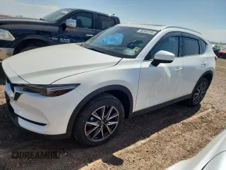 2018 Mazda CX-5 Grand Touring z VIN JM3KFBDM1J0473754, wystawiony jako Copart lot #60362245 z przebiegiem 72 792 mil mil oraz Szkoda całkowita • Salvage title. Historia ofert i sprzedaży dostępna na DreamBid. Obrazek 1.