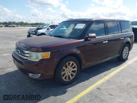 2009 Ford Flex SEL z VIN 2FMDK52C59BA08554, wystawiony jako IAAI lot #42310963 z przebiegiem 165 318 mil mil oraz . Historia ofert i sprzedaży dostępna na DreamBid. Obrazek 2.