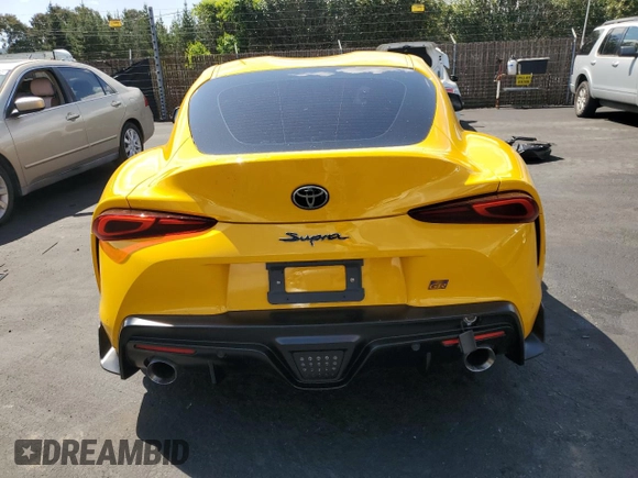 2021 Toyota Supra 3.0 z VIN WZ1DB0C01MW034802, wystawiony jako Copart lot #51387765 z przebiegiem Nie podano mil oraz Szkoda całkowita • Salvage title. Historia ofert i sprzedaży dostępna na DreamBid. Obrazek 6.