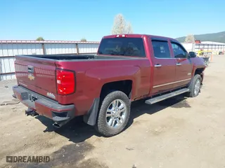 2015 Chevrolet Silverado 2500HD Built After Aug 14 High Country with VIN 1GC1KXEG1FF500025, listed as a IAAI auction lot 42042084 with 164,353 mi miles. Bid and sale history available at carsss.com. Image 4.