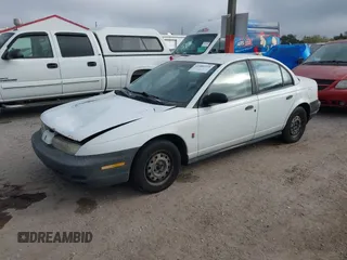 1999 Saturn SL with VIN 1G8ZH5284XZ318834, listed as a IAAI auction lot 41486518 with 178,227 mi miles. Bid and sale history available at carsss.com. Image 2.