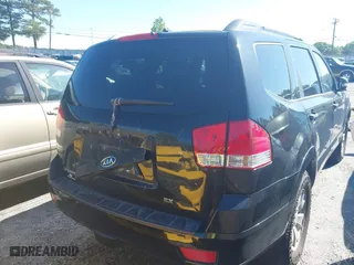 2009 Kia Borrego LX with VIN KNDJJ741295020182, listed as a IAAI auction lot 42012595 with 170,929 mi miles. Bid and sale history available at carsss.com. Image 4.