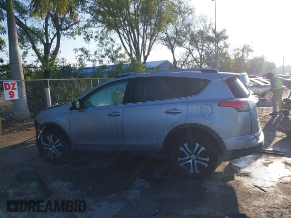 2017 Toyota RAV4 LE with VIN 2T3BFREV1HW607984, listed as a IAAI auction lot 41878970 with 136,941 mi miles and . Bid and sale history available at DreamBid. Image 14.