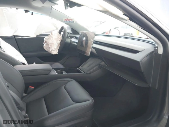 2025 Tesla Model 3 Long Range with VIN 5YJ3E1EBXSF912475, listed as a IAAI auction lot 41449488 with 3,100 mi miles. Bid and sale history available at carsss.com. Image 5.