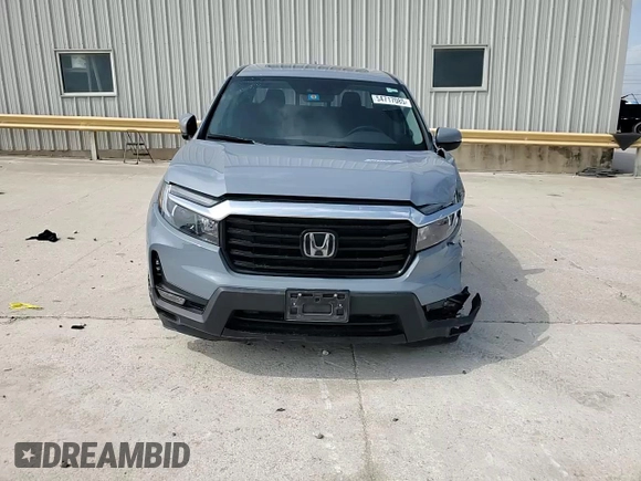 2023 Honda Ridgeline RTL-E with VIN 5FPYK3F76PB036572, listed as a Copart auction lot 54717085 with 34,516 mi miles and Salvage title. Bid and sale history available at DreamBid. Image 13.