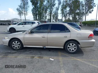 2001 Honda Accord EX z VIN 1HGCG66821A084618, wystawiony jako IAAI lot #41959020 z przebiegiem 272 671 mil mil oraz . Historia ofert i sprzedaży dostępna na DreamBid. Obrazek 14.