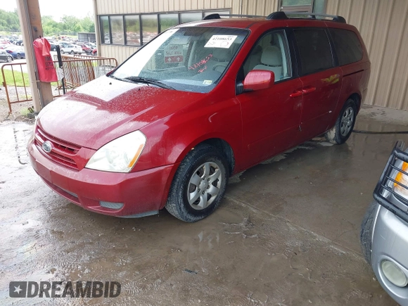 2009 Kia Sedona LX with VIN KNDMB233X96277536, listed as a IAAI auction lot 42108653 with 260,258 mi miles. Bid and sale history available at carsss.com. Image 2.
