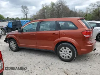 2014 Dodge Journey American Value with VIN 3C4PDCAB8ET133197, listed as a Copart auction lot 51381145 with 191,269 mi miles and Salvage title. Bid and sale history available at DreamBid. Image 2.
