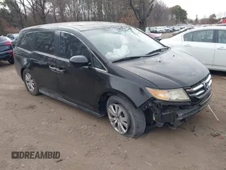 2015 Honda Odyssey with VIN 5FNRL5H60FB011806, listed as a IAAI auction lot 41791543 with 161,116 mi miles and . Bid and sale history available at DreamBid. Image 1.