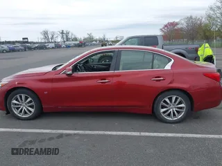 2014 Infiniti Q50 Sport with VIN JN1BV7AR1EM701939, listed as a IAAI auction lot 42051058 with 142,258 mi miles and . Bid and sale history available at DreamBid. Image 14.