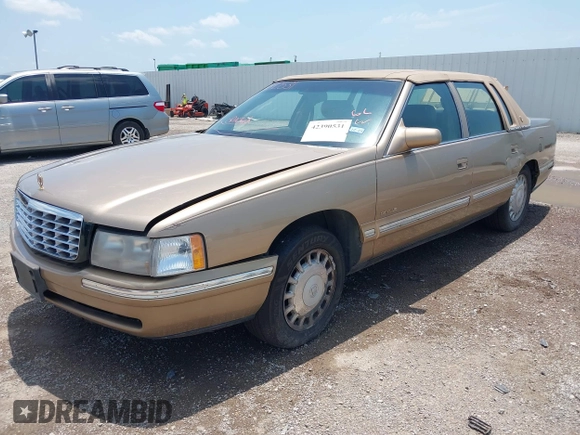 1999 Cadillac DeVille z VIN 1G6KD54Y2XU788781, wystawiony jako IAAI lot #42390531 z przebiegiem 180 328 mil mil oraz . Historia ofert i sprzedaży dostępna na DreamBid. Obrazek 2.