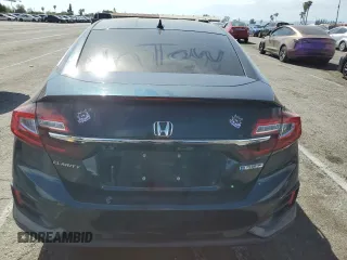 2018 Honda Clarity z VIN JHMZC5F18JC016134, wystawiony jako Copart lot #52578025 z przebiegiem 133 421 mil mil oraz Szkoda całkowita • Salvage title. Historia ofert i sprzedaży dostępna na DreamBid. Obrazek 6.