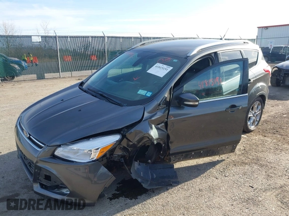 2015 Ford Escape Titanium with VIN 1FMCU9J90FUB58306, listed as a IAAI auction lot 41815151 with 136,835 mi miles. Bid and sale history available at carsss.com. Image 2.