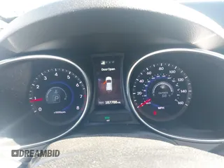 2013 Hyundai Santa Fe Sport z VIN 5XYZU3LA1DG112226, wystawiony jako IAAI lot #42241119 z przebiegiem 187 788 mil mil oraz . Historia ofert i sprzedaży dostępna na DreamBid. Obrazek 7.