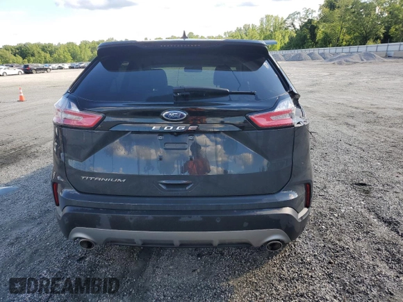 2021 Ford Edge Titanium z VIN 2FMPK3K96MBA54764, wystawiony jako Copart lot #55593715 z przebiegiem 49 729 mil mil oraz Szkoda całkowita • Salvage title. Historia ofert i sprzedaży dostępna na DreamBid. Obrazek 6.