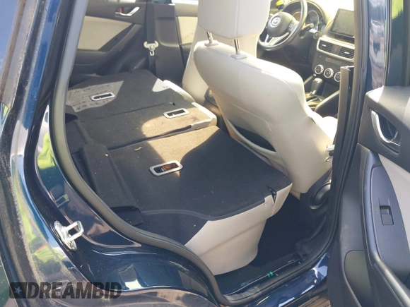 2016 Mazda CX-5 Touring with VIN JM3KE4CY0G0916908, listed as a IAAI auction lot 41848823 with 53,255 mi miles. Bid and sale history available at carsss.com. Image 8.