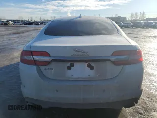 2015 Jaguar XF with VIN SAJXA0FS5FPU49437, listed as a Copart auction lot 84757254 with 99,301 mi miles and Salvage Title. Bid and sale history available at DreamBid. Image 6.