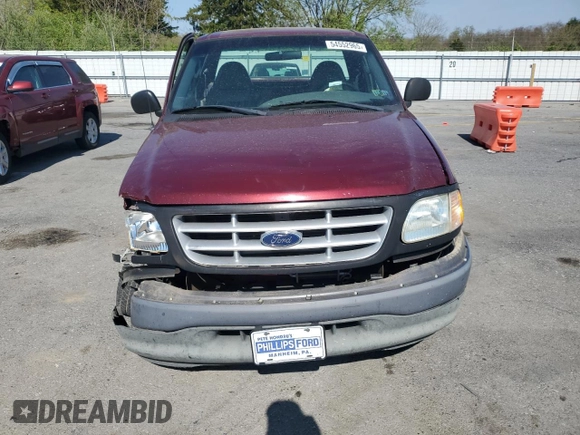 2003 Ford F-150 XL with VIN 1FTRF17293NA33833, listed as a Copart auction lot 54552965 with 70,016 mi miles and Salvage Title. Bid and sale history available at DreamBid. Image 5.