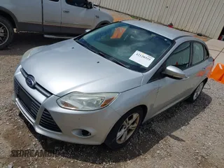 2014 Ford Focus SE with VIN 1FADP3F28EL162669, listed as a IAAI auction lot 42128555 with 104,265 mi miles and . Bid and sale history available at carsss.com. Image 2.