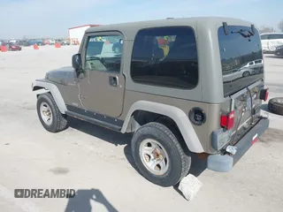 2006 Jeep Wrangler Sport Right Hand Drive with VIN 1J4F449S46P716520, listed as a IAAI auction lot 41763887 with 236,816 mi miles. Bid and sale history available at carsss.com. Image 3.