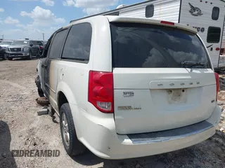 2013 Dodge Grand Caravan SXT with VIN 2C4RDGCG5DR524074, listed as a IAAI auction lot 37312051 with Not Provided miles and . Bid and sale history available at DreamBid. Image 3.