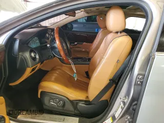 2013 Jaguar XJ with VIN SAJWJ1CD1D8V51462, listed as a Copart auction lot 50527985 with 62,995 mi miles and Salvage title. Bid and sale history available at DreamBid. Image 7.