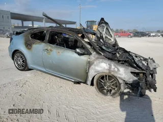 2005 Scion tC z VIN JTKDE177450021400, wystawiony jako Copart lot #57437935 z przebiegiem Nie podano mil oraz Szkody całkowita. Historia ofert i sprzedaży dostępna na DreamBid. Obrazek 4.