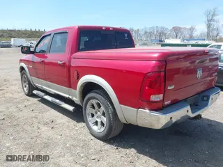 2010 Dodge Ram 1500 Sport with VIN 1D7RV1CT1AS140168, listed as a IAAI auction lot 42087902 with 143,324 mi miles. Bid and sale history available at carsss.com. Image 3.