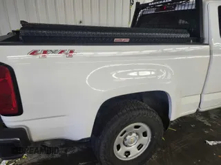 2018 Chevrolet Colorado 4WD Work Truck with VIN 1GCHTBEN7J1252687, listed as a IAAI auction lot 42802221 with 102,143 mi miles and . Bid and sale history available at DreamBid. Image 7.