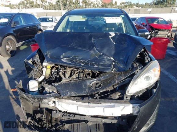 2014 Mazda 5 Sport with VIN JM1CW2BL1E0163682, listed as a IAAI auction lot 41344215 with 63,811 mi miles and . Bid and sale history available at carsss.com. Image 12.