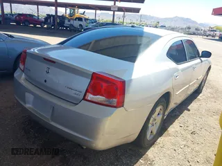 2010 Dodge Charger SXT with VIN 2B3CA3CV2AH180910, listed as a IAAI auction lot 42101292 with 177,028 mi miles and . Bid and sale history available at carsss.com. Image 4.