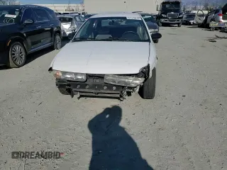 1996 Saturn SL with VIN 1G8ZK5279TZ162812, listed as a Copart auction lot 87079874 with 143,461 mi miles and Salvage title. Bid and sale history available at DreamBid. Image 11.