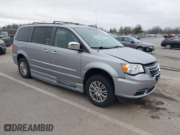 2013 Chrysler Town & Country Touring-L with VIN 2C4RC1CG0DR684329, listed as a IAAI auction lot 41919921 with 101,868 mi miles. Bid and sale history available at carsss.com. Image 1.