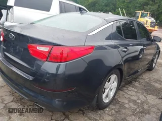 2015 Kia Optima LX with VIN 5XXGM4A70FG486256, listed as a IAAI auction lot 42211318 with 141,515 mi miles and . Bid and sale history available at DreamBid. Image 4.
