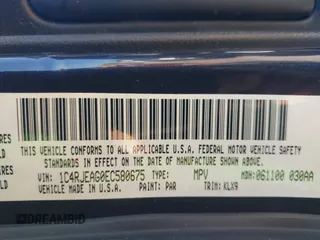 2014 Jeep Grand Cherokee Laredo with VIN 1C4RJEAG0EC580675, listed as a IAAI auction lot 41773879 with 127,714 mi miles. Bid and sale history available at carsss.com. Image 9.