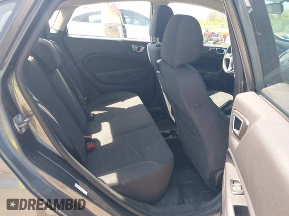 2015 Ford Fiesta SE with VIN 3FADP4BJ6FM160227, listed as a IAAI auction lot 42239191 with 131,614 mi miles and . Bid and sale history available at DreamBid. Image 8.