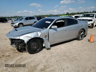 2021 Dodge Charger R/T with VIN 2C3CDXCT6MH521973, listed as a Copart auction lot 50522725 with 97,781 mi miles and Salvage Title. Bid and sale history available at carsss.com. Image 1.
