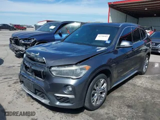 2017 BMW X1 xDrive28i with VIN WBXHT3Z33H4A65198, listed as a IAAI auction lot 41798503 with 88,951 mi miles. Bid and sale history available at carsss.com. Image 19.