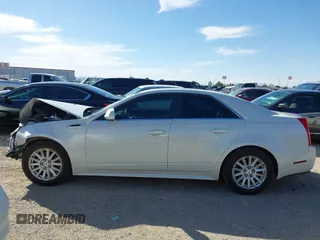 2013 Cadillac CTS Luxury with VIN 1G6DF5E51D0165324, listed as a IAAI auction lot 42099692 with 163,758 mi miles and . Bid and sale history available at DreamBid. Image 14.