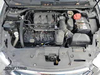 2014 Ford Taurus SEL z VIN 1FAHP2E80EG174910, wystawiony jako Copart lot #56070945 z przebiegiem 147 201 mil mil oraz Szkody całkowita. Historia ofert i sprzedaży dostępna na DreamBid. Obrazek 11.