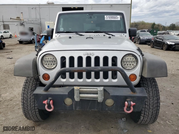 2008 Jeep Wrangler Unlimited X with VIN 1J4GA39138L546823, listed as a Copart auction lot 51698665 with 268,652 mi miles and Salvage Title. Bid and sale history available at carsss.com. Image 5.